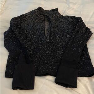 Lululemon cropped half zip…size 4 Black Speckled Top